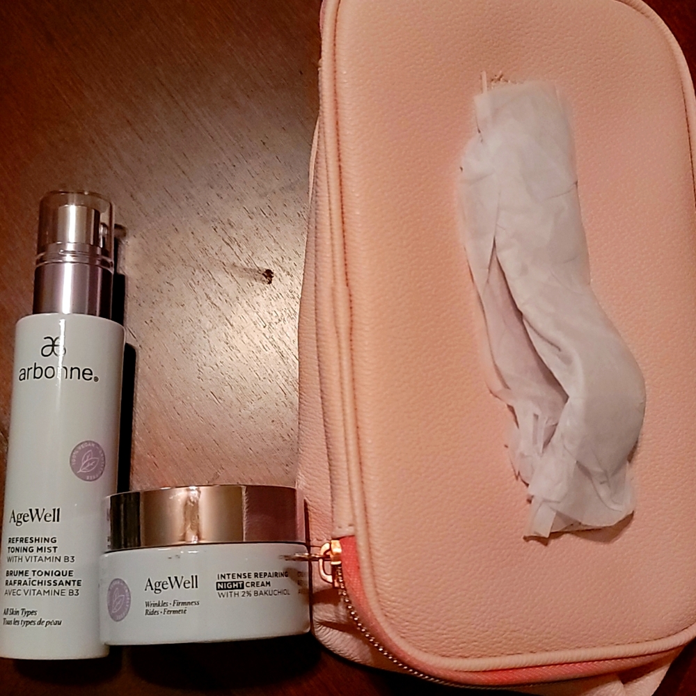 Arbonne AgeWell skincare and travel makeup tote